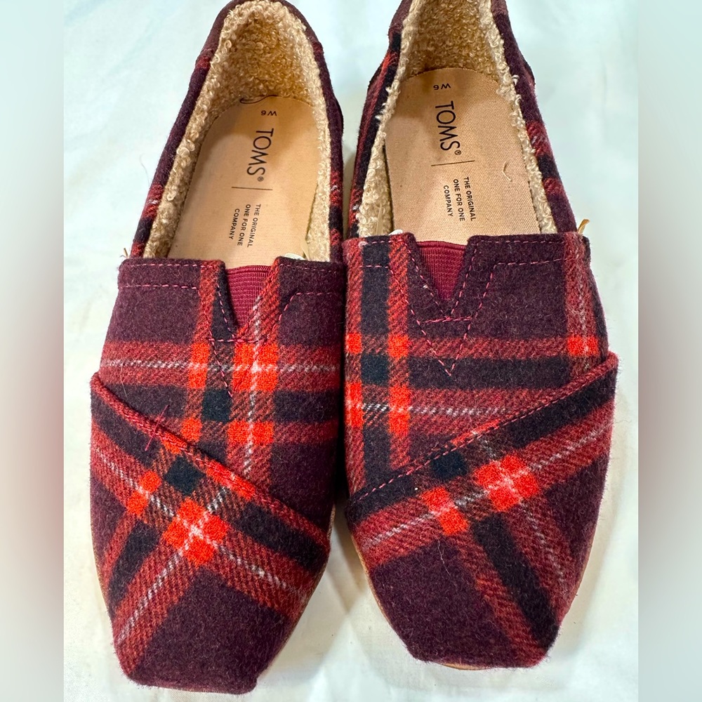 Toms slip on flats, red and black women’s shoes size 6
